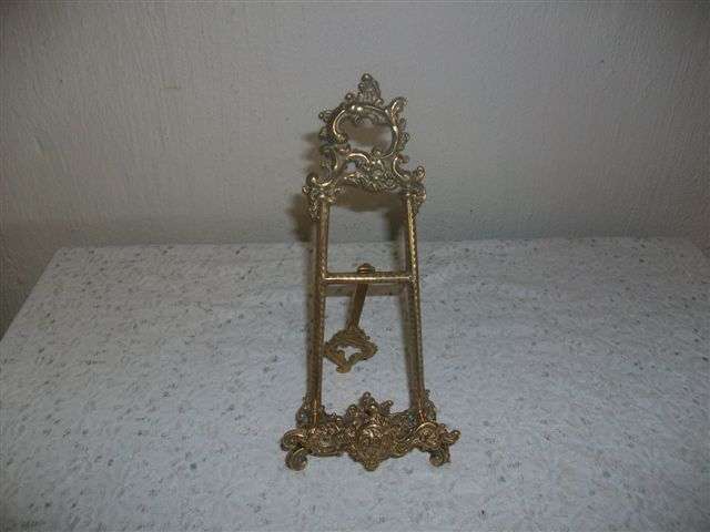 Ornate vintage brass picture stand