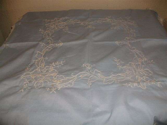 Beatifully embroidered blue square tablecloth