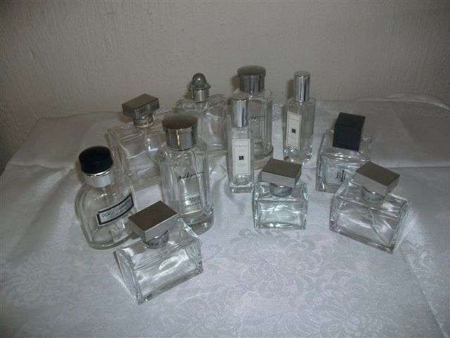 Large collection of empty perfume bottles