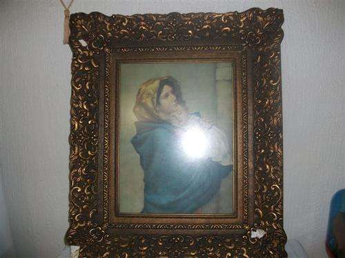 Large and stunning vintage ornate frame with a religious print behind glass
