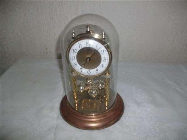 Dome battery operated metal clock in working order