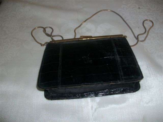 Ladies small black leather vintage handbag