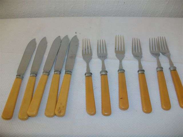 A set of vintage bone handle fish knives and forks