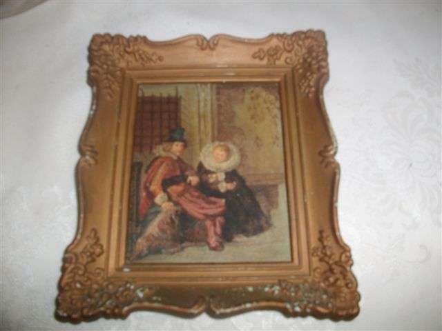 Lovely medium sized ornate frame with oil looking vintage picture