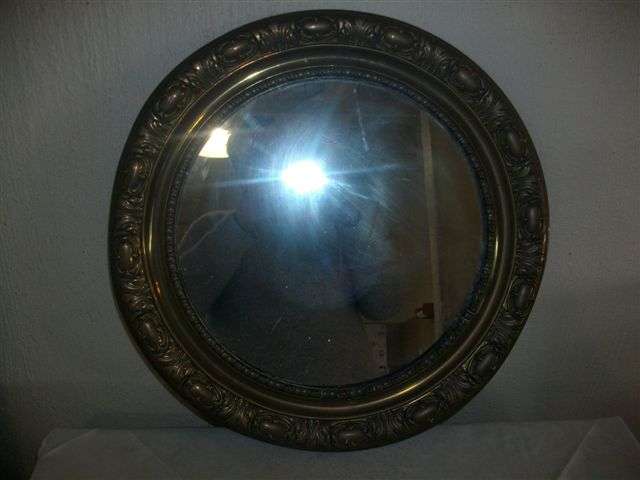 Round brass framed vintage style wall mirror