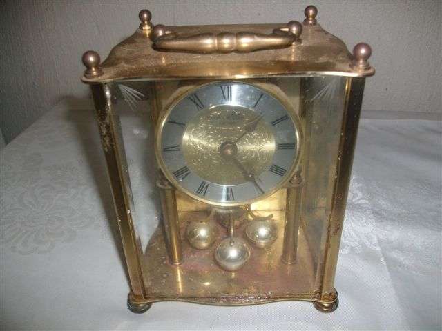 Gold plated glass made in germany battery operated metal clock working order
