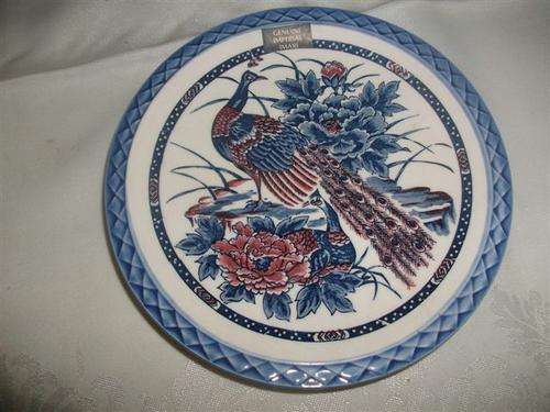 Blue and white oriental style peacock wall plate