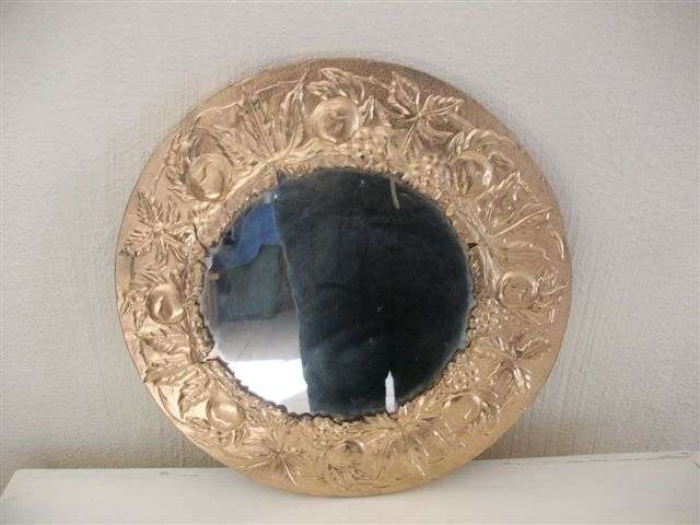 Round gold painted vintage looking wall mirror