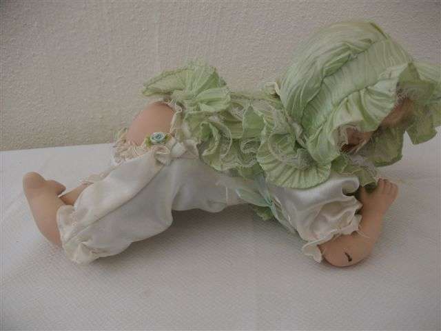 Lovely crawling baby porcelain doll