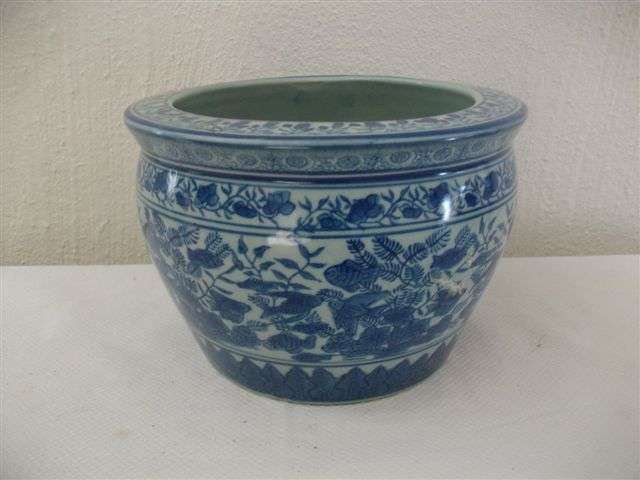 Oriental style blue and white ceramic pot plant holder