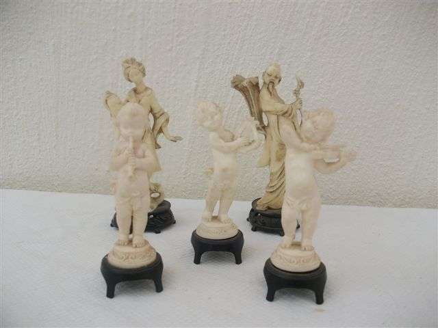 Collection of hard plastic vintage cherubs and oriental figurines