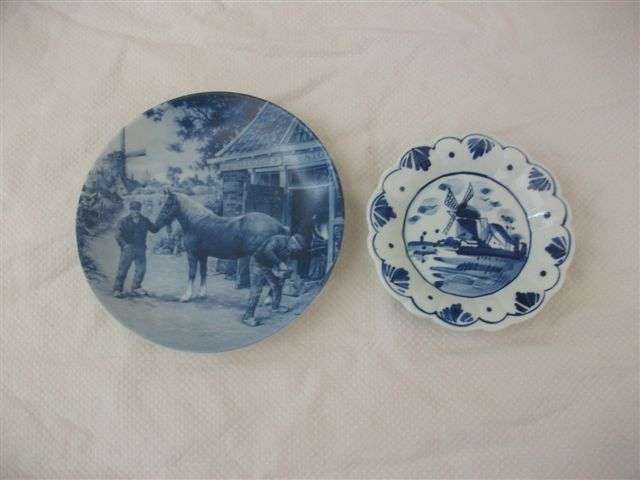 Two small blue and white delft plates for the collector
