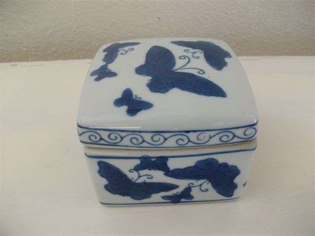 Blue and white ceramic butterfly trinket box