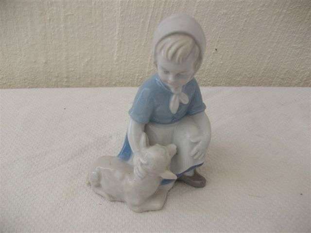 Lovely blue and white lladro style girl figurine with her sheep