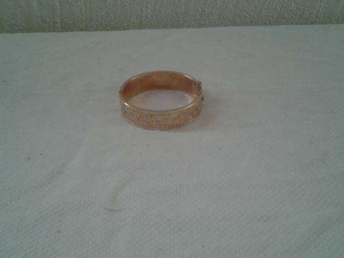 9ct gold ladies bangle with a metal core