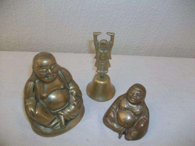 A collection of brass buddha's