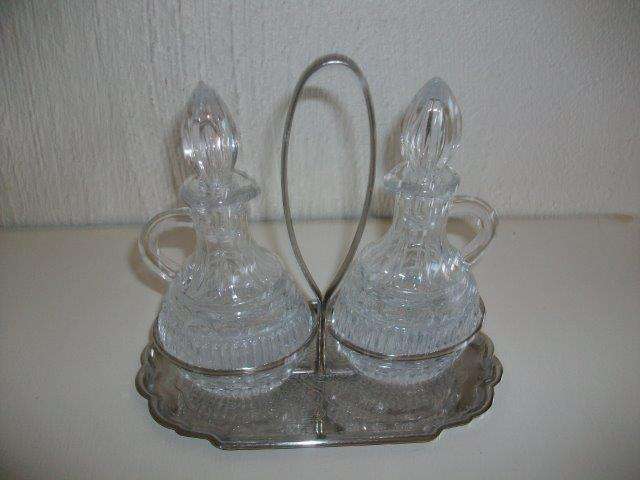 Glass oil and vinegar set on sliver chrome plated stand