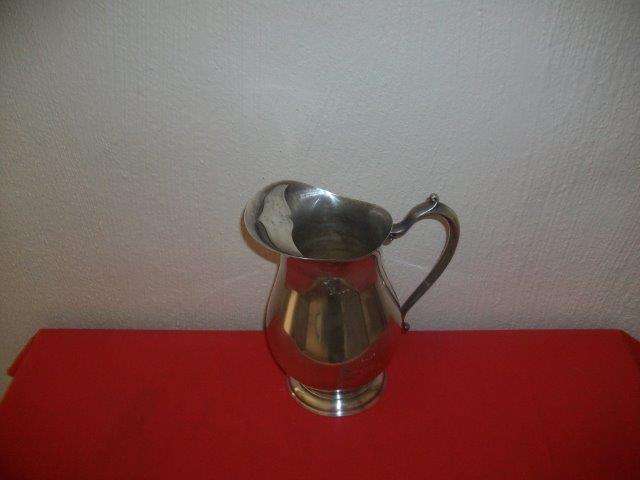 Vintage sliver plated water jug with some engraving noted