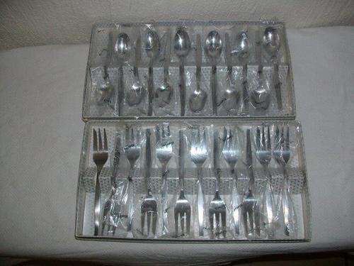 Boxed set of stainless steel cake forks and tea spoons never used