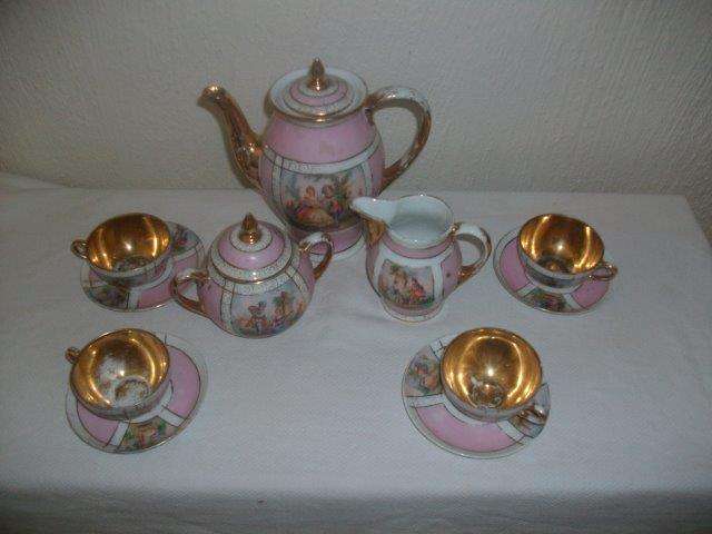 Pretty in pink romantic scene tea set incomplete with some damage