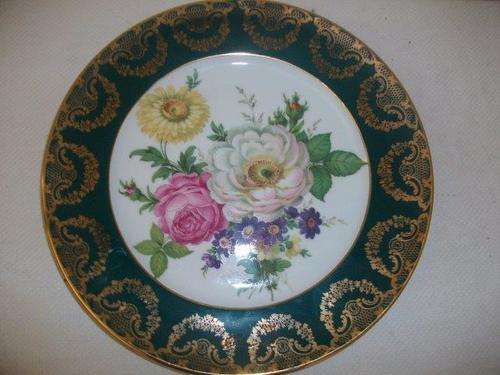 Pretty vintage wall plate decorated with flowers