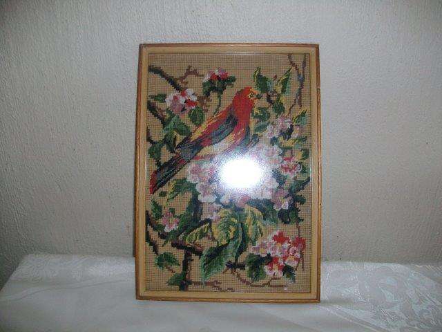 lot  two medium sized framed bird tapestry behind glass
