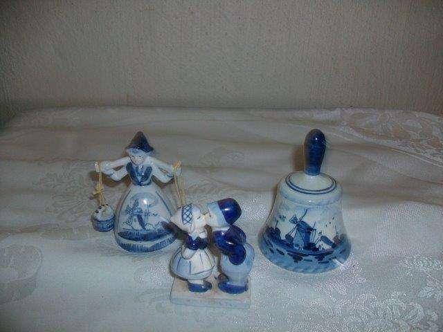 A collection of three blue and white delft and other ornaments