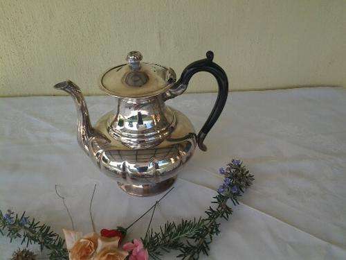 Vintage sliver plated tea pot with black handle