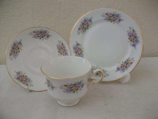 last one vintage queen anne tea cup trio with a small purple flower pattern