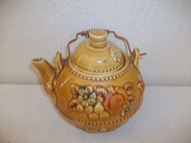 Vintage yellow tea pot