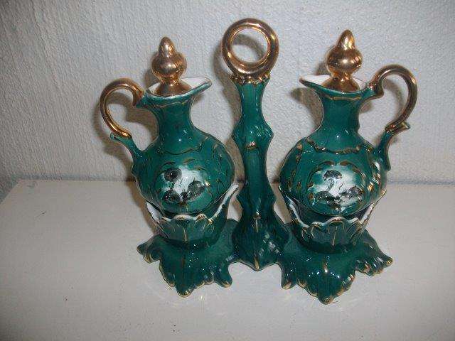 Gorgeous green colored oil and vinegar ceramic set on stand