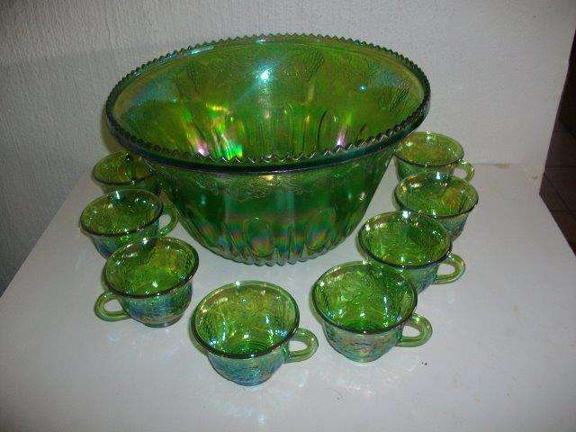 Gorgeous green carnival glass punch bowl with cups