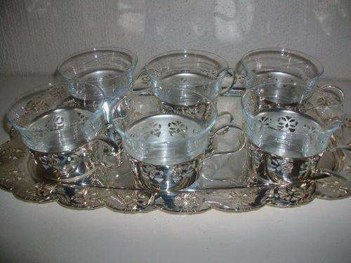Nice sliver plated tray with a set of six glass cups with sliver plated holders