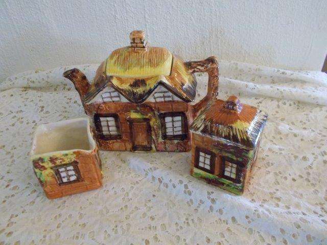 cottage style tea pot and milk jug and sugar bowl set