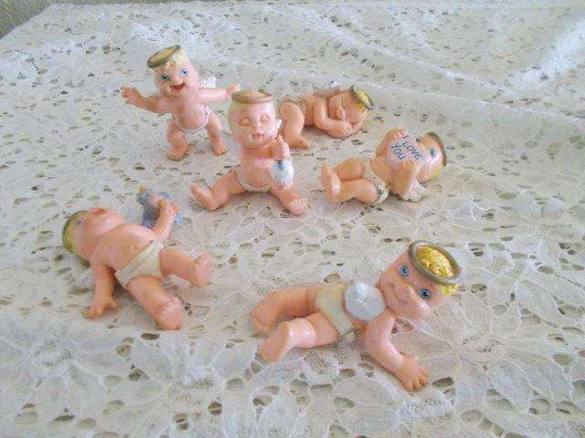 A collection of collectable magic dipper babies angles lot