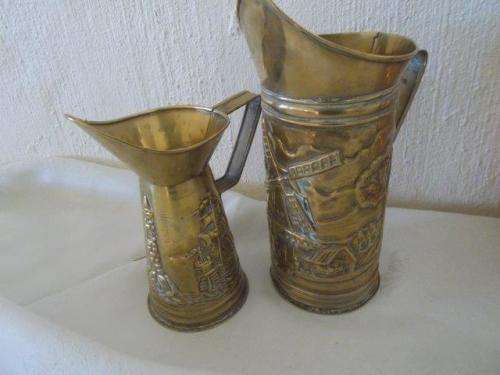 nice pair of decorative brass jugs