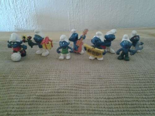 a collection of vintage smurfs