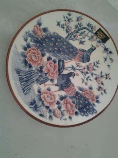 nice small oriental peacock scene wall plate