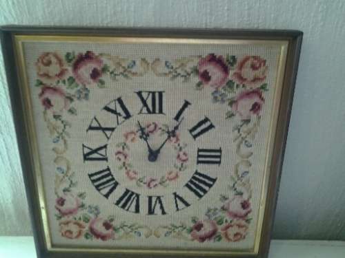 nice framed tapersty of a clock item not tested