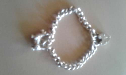 nice sliver stamped charm bangle with scottie dog charm