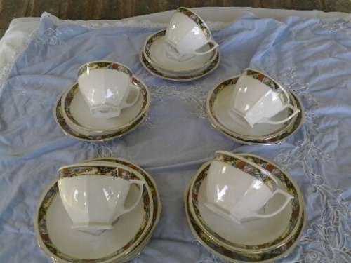 A set of five pretty floarl pattern protea  tea cup trios