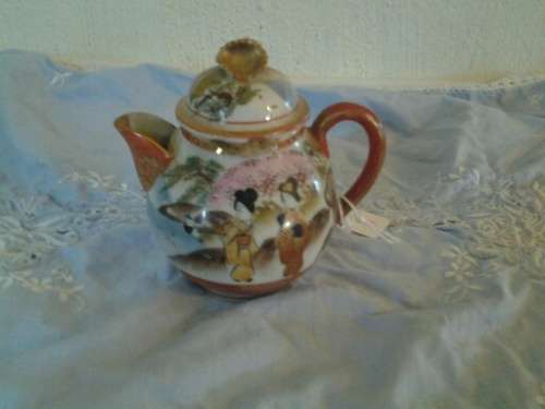 small oriental handpainted milk jug with lid