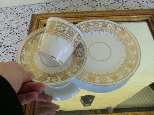 pretty vintage gold and white tea cup trio