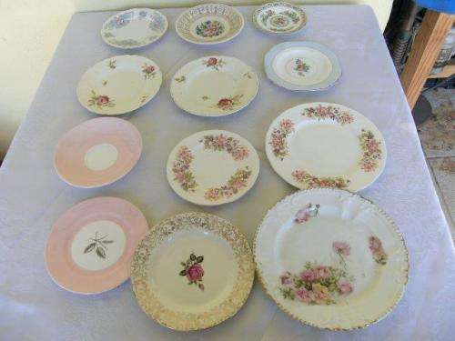 Assorted pretty odd vintage porcelain side plates and saucers job lot