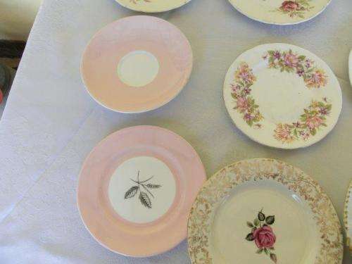Assorted pretty odd vintage porcelain side plates and saucers job lot