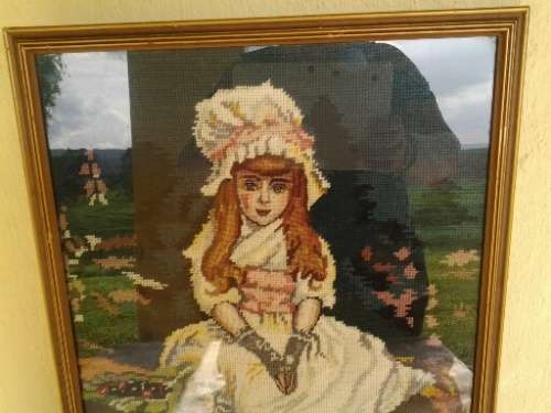 stunning framed girl tapersty behind glass framed