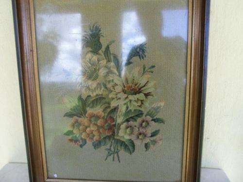 Stunning floarl scene framed behind glass tapersty
