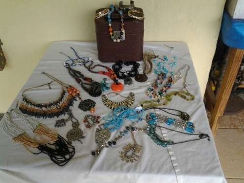 huge collection of some costume jewerllery in a vainty case