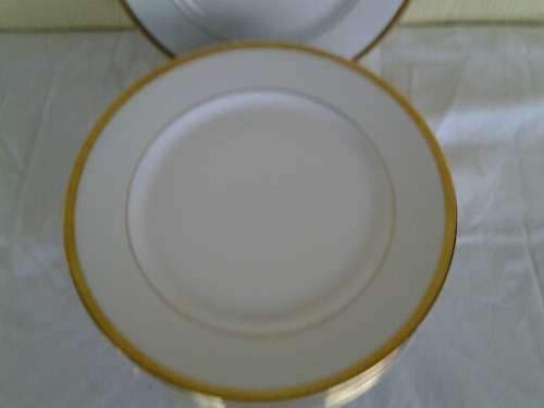 Set of eight mordern made for woolworths white and gold side plates