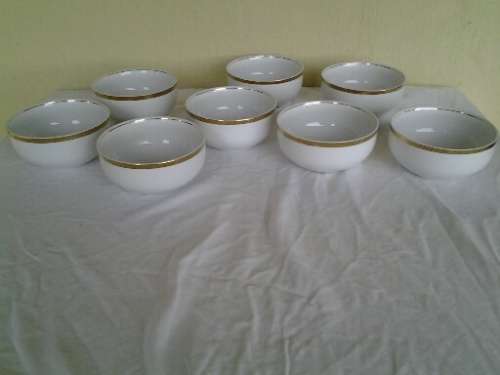 Set of eight modern white and gold made for woolworths pudding bowls